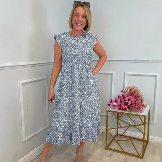DIANE – MOEITELOZE ELEGANTIE SMOCK JURK 1