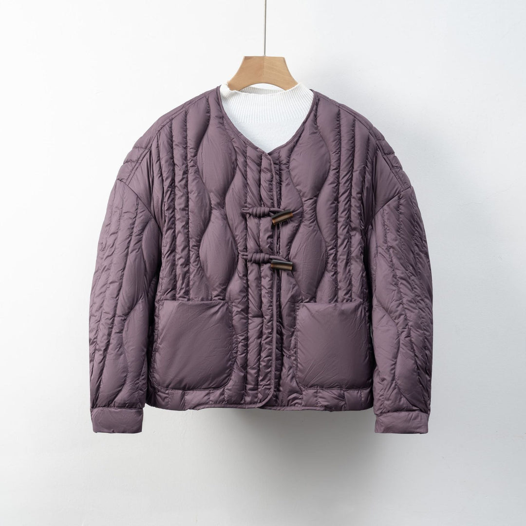 Damen Steppjacke mit Knopfverschluss | Warme Winterjacke 0