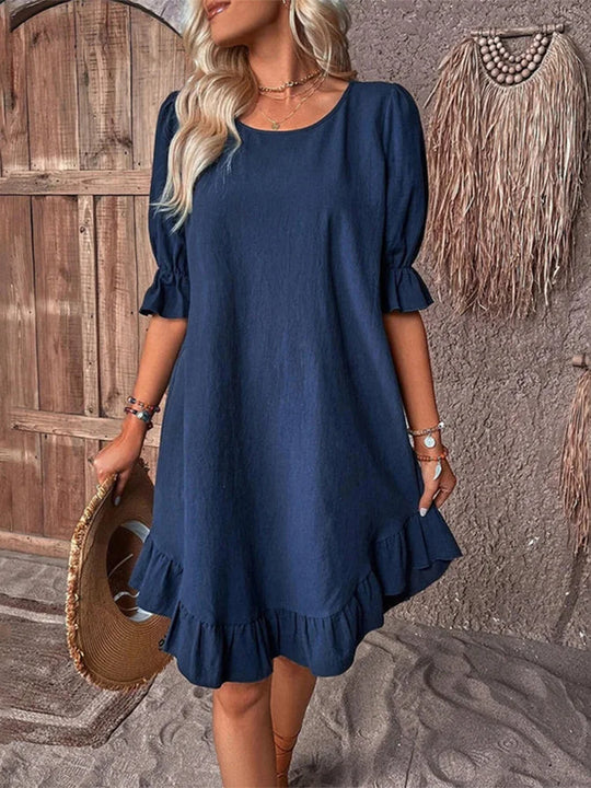 Dames Elegante Midi zomerjurk met korte mouwen en ronde hals - Mieke