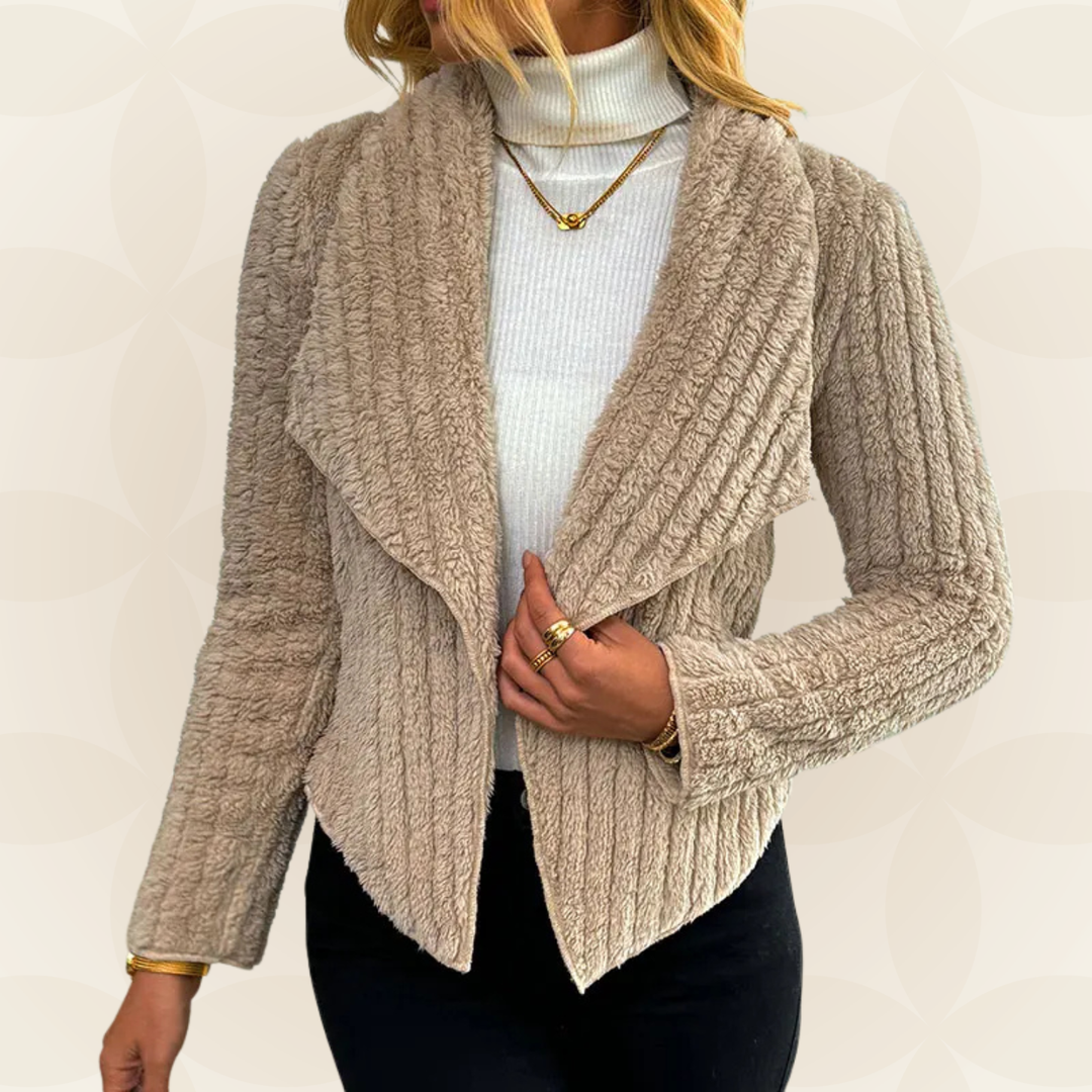 Danisha – Beige vest met ribstructuur 1