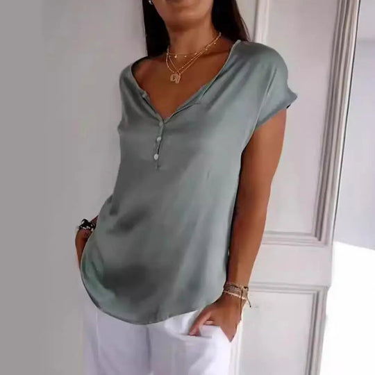 Elegante top Dames | V-hals & knoopdetails