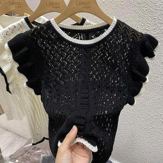 Gehaakte gebreide top met contrasterende bies 1